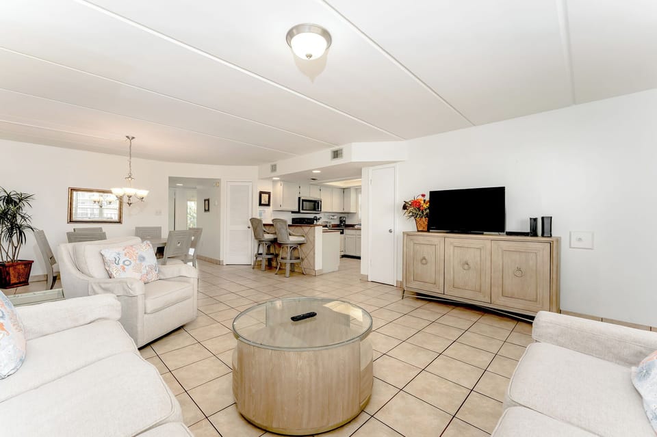 The living space is open and airy with soft wood accents that gives off ultra calming vibes!
