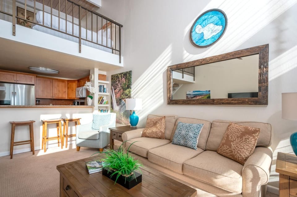 From waterfall art to aqua glass lamps, every detail complements the show-stopping view just beyond the glass