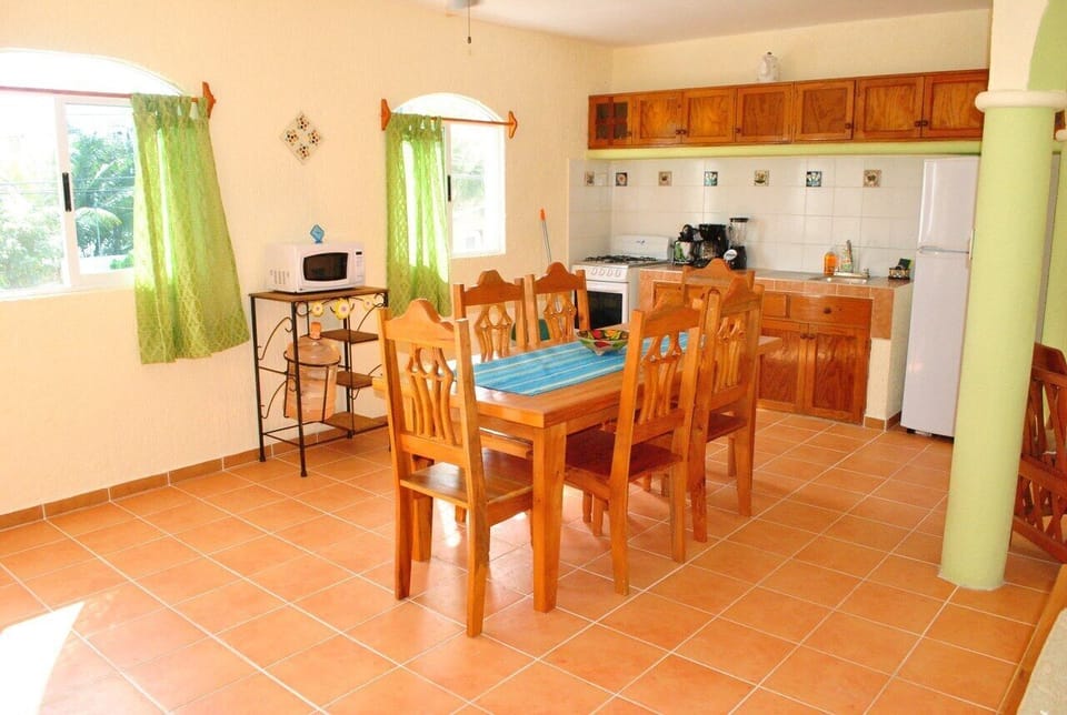 Large kitchen - Large sunny, breezy, well equipped kitchen with a table for 6.