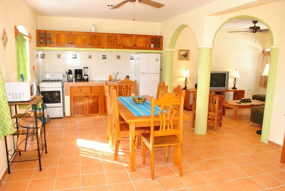 View of kitchen, LR - View from the entrance door of the kitchen and living room area.