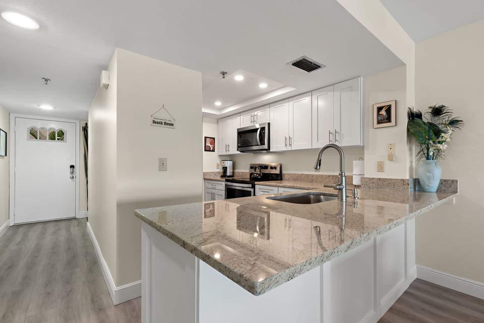 Brand new Granite, Cabinets and Appliances at the Fully stocked kitchen