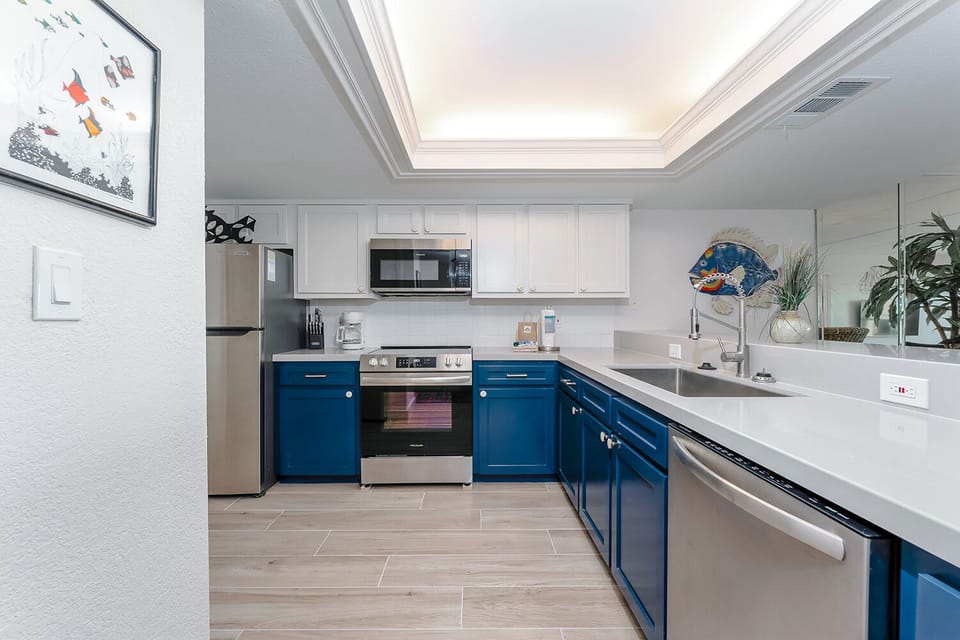 Our brand-new kitchen is my new favorite place. You're going to love it, too. The full-size appliances will make you feel right at home.