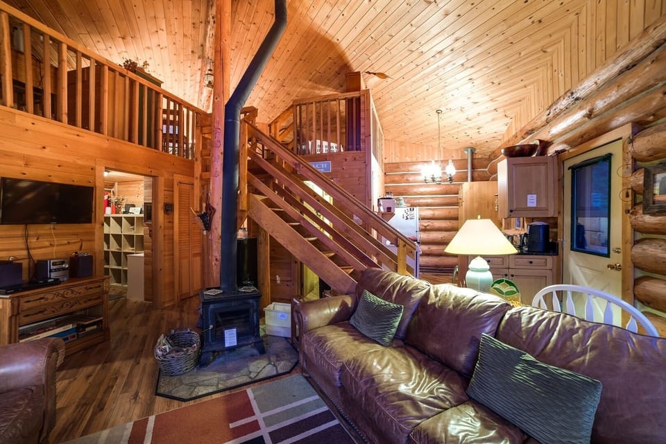 Living room with wood burning fireplace