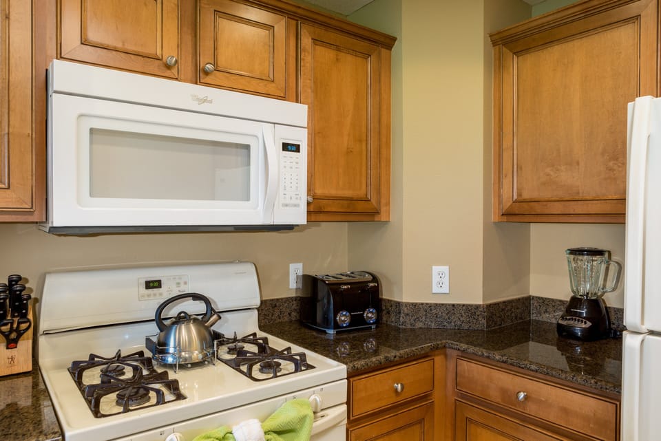 Fully equipped kitchen with granite counter tops