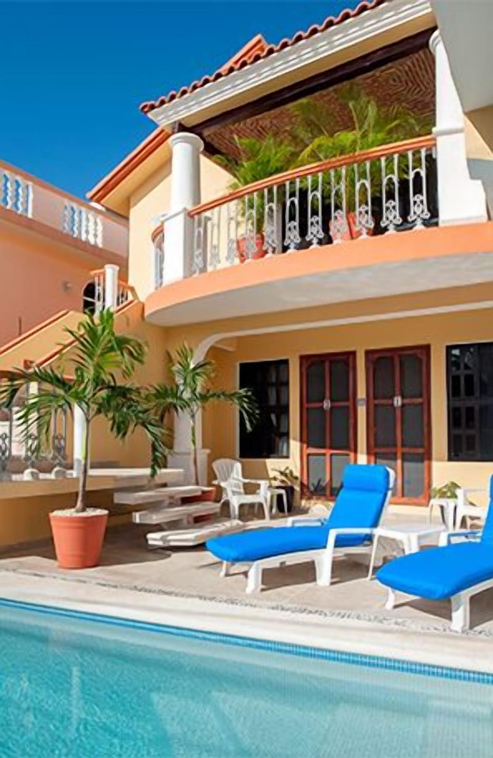 Front door opens onto the pool