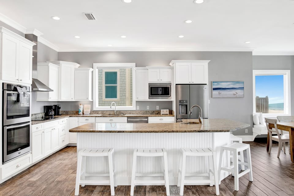 The kitchen is fully equipped and offers dual appliances