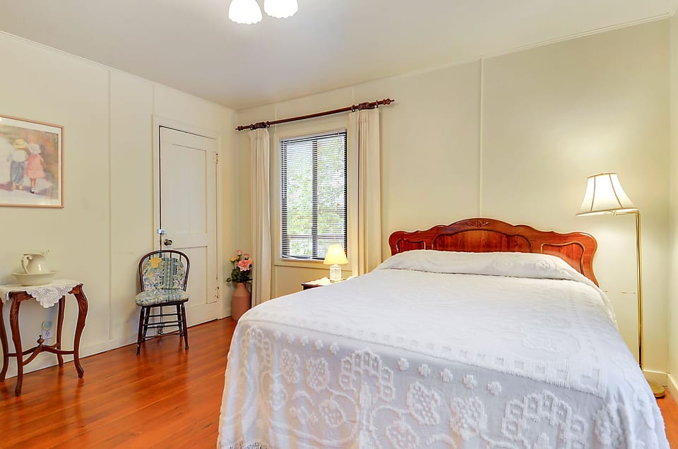 Downstairs - Primary bedroom: Queen bed - steps from the bathroom and common areas.