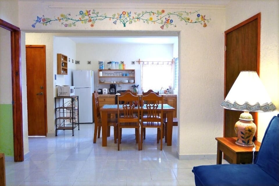 LR Kit - Hand painted wall decoration adds Mexican flare to cute first floor unit.