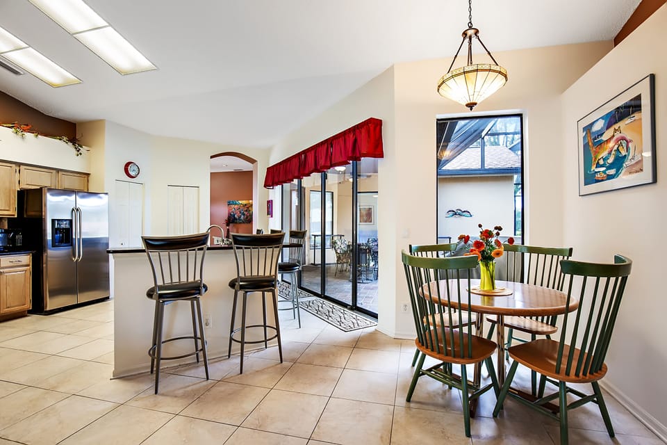 Centrally located kitchen stocked with all you need for cooking.