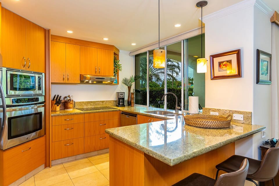Fully equipped kitchen with stainless steel appliances