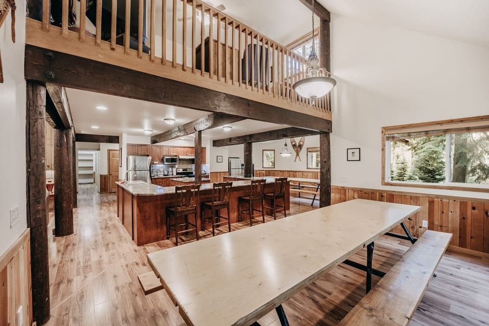 Another view of dining areas and kitchen