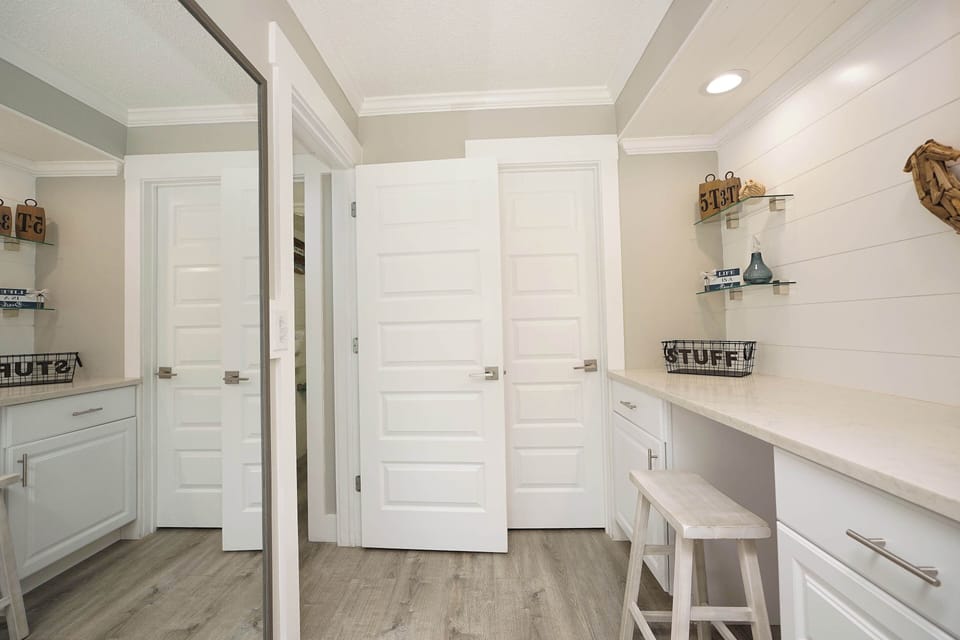 Your laundry room combines style with function, featuring ample counter space and organized storage for all your cleaning needs.