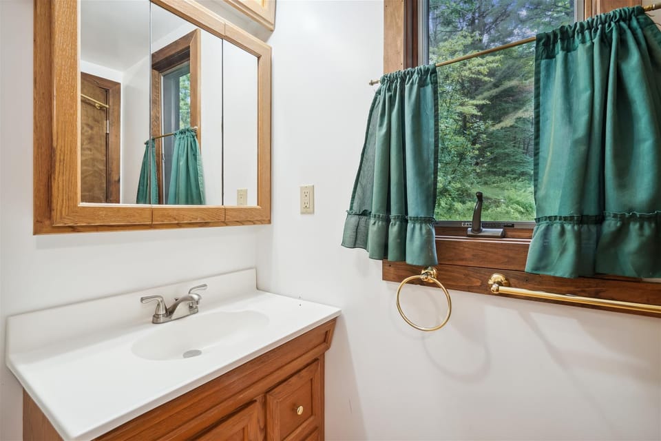 Vanity Area - Clean lines and practical design provide extra convenience throughout your mountain retreat.