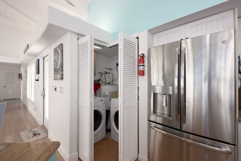 Washer and dryer set (with a second set located on the lower level near garage)