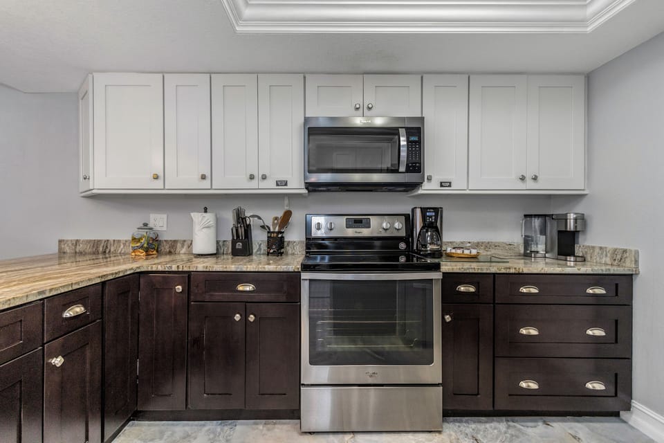 Kitchen stocked for cooking, serving and baking