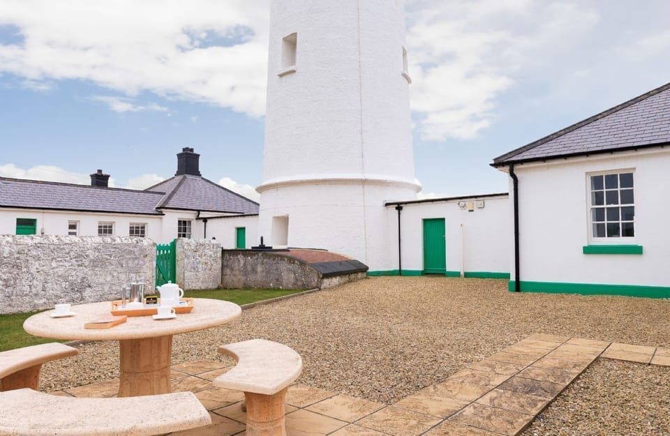 Ariel, Nash Point Lighthouse:  Fully enclosed garden with stone garden furniture