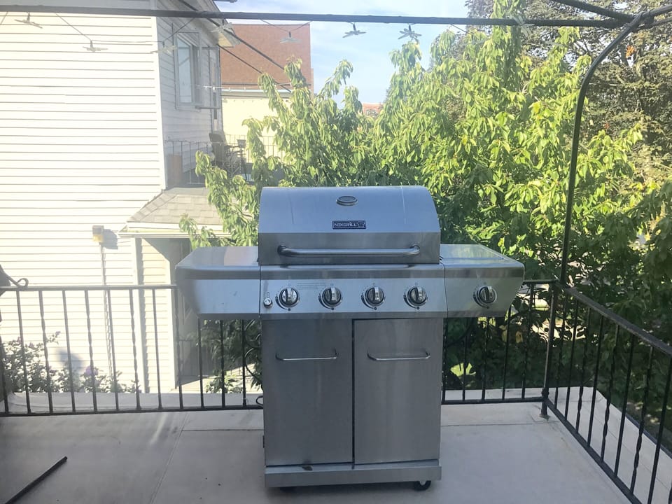 Gas grill on the back balcony second floor. Two gas grills total. 