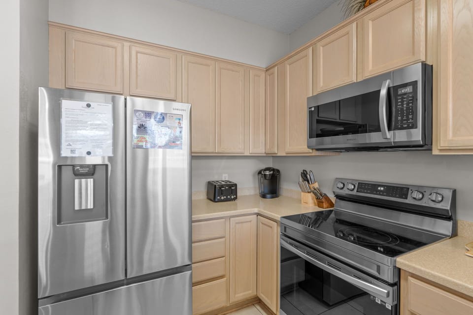 Your kitchen comes fully equipped with modern stainless appliances, plenty of cabinet space, and everything needed to prepare delicious meals during your stay.