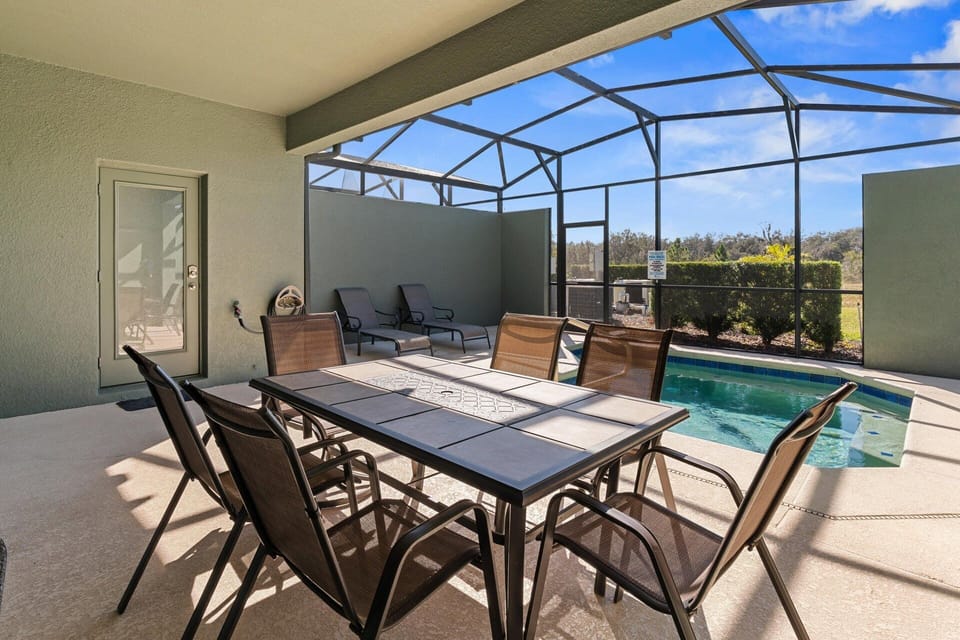 Patio Dining
Pool Faces West