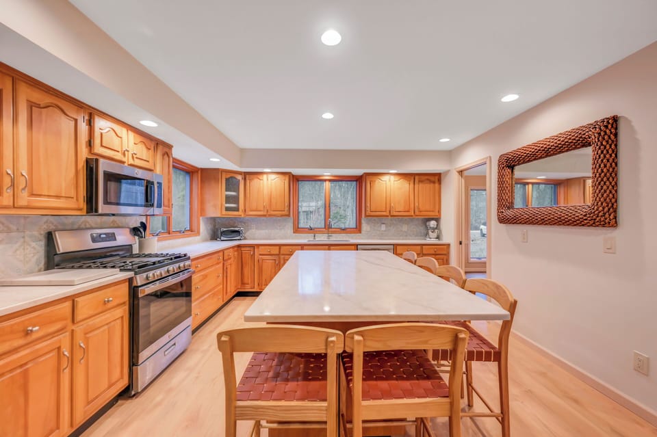 New kitchen - fully stocked with pots and pans, utensils, plates and glassware