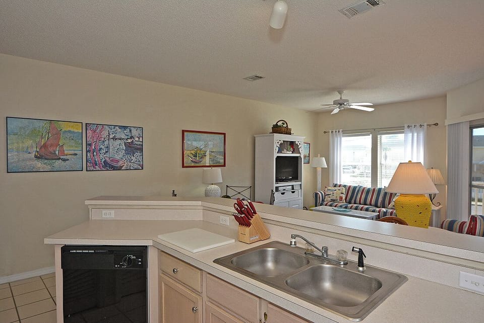 Cook with ease in your fully-equipped kitchen while staying connected to the comfortable living space beyond.
