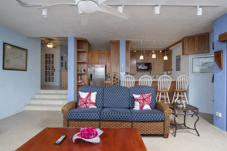 Living area opens to the dining area and kitchen.