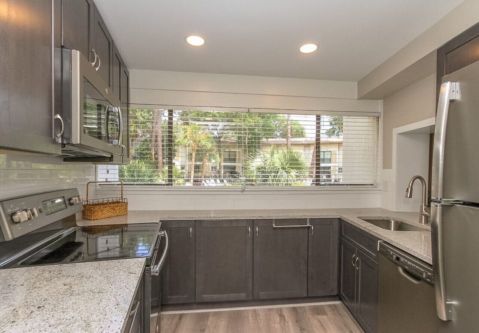 Kitchen - • Kitchen : Coffee Maker, Cookware, Full Kitchen, Microwave, Refrigerator, Dishwasher, Stove.
