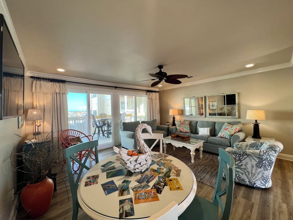 Relax in your coastal living room with ocean views and charming nautical decor that invites you to unwind after beach adventures.