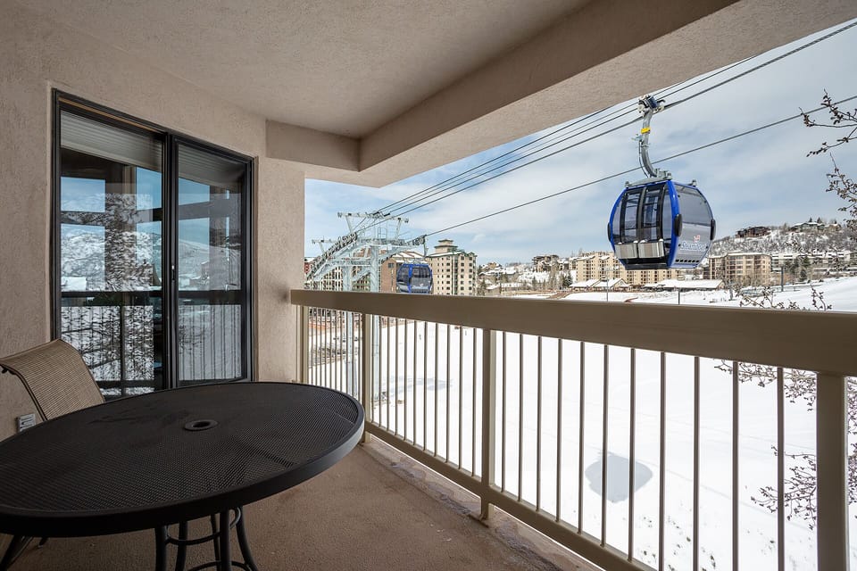 You'll love watching the gondola glide by from your private balcony while enjoying morning coffee at your outdoor table.