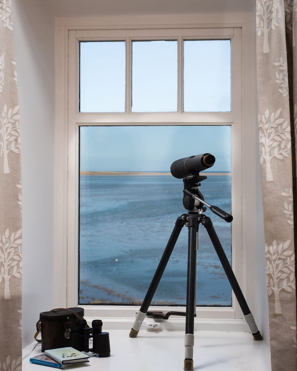 Budle Bay Loft - enjoy wildlife watching from the  sitting room window with the telescope and binoculars provided