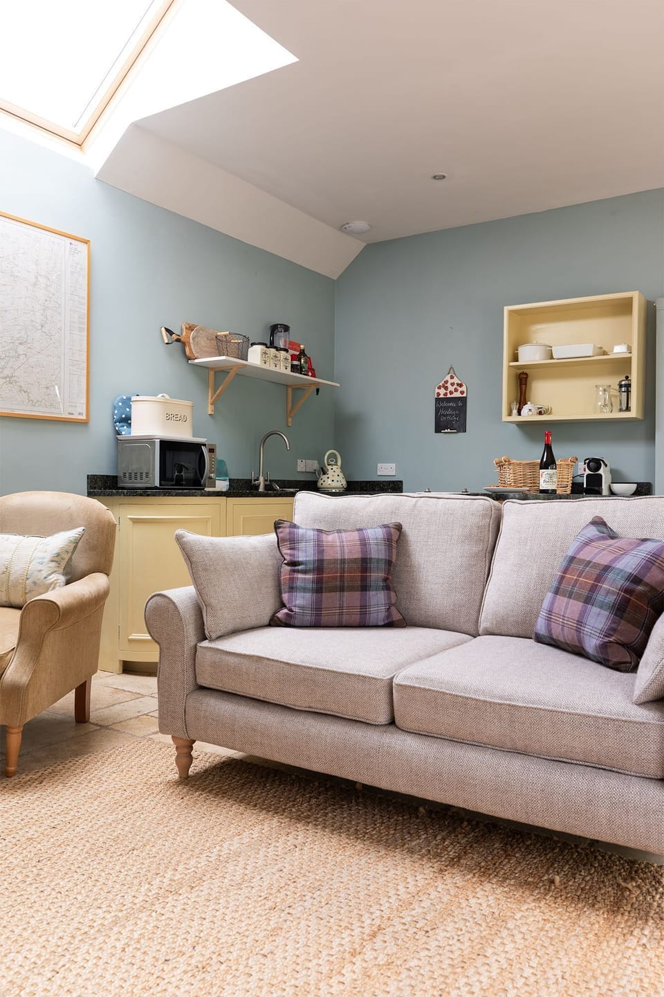 The Heritage - two seater sofa and armchair in the open plan living area