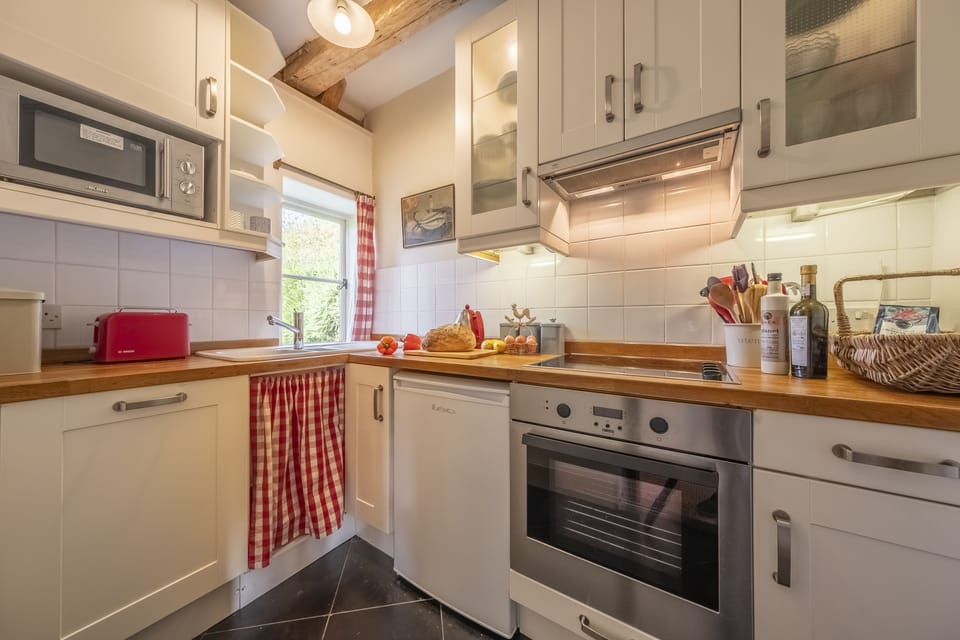 Well-equipped kitchen with a microwave and dishwasher