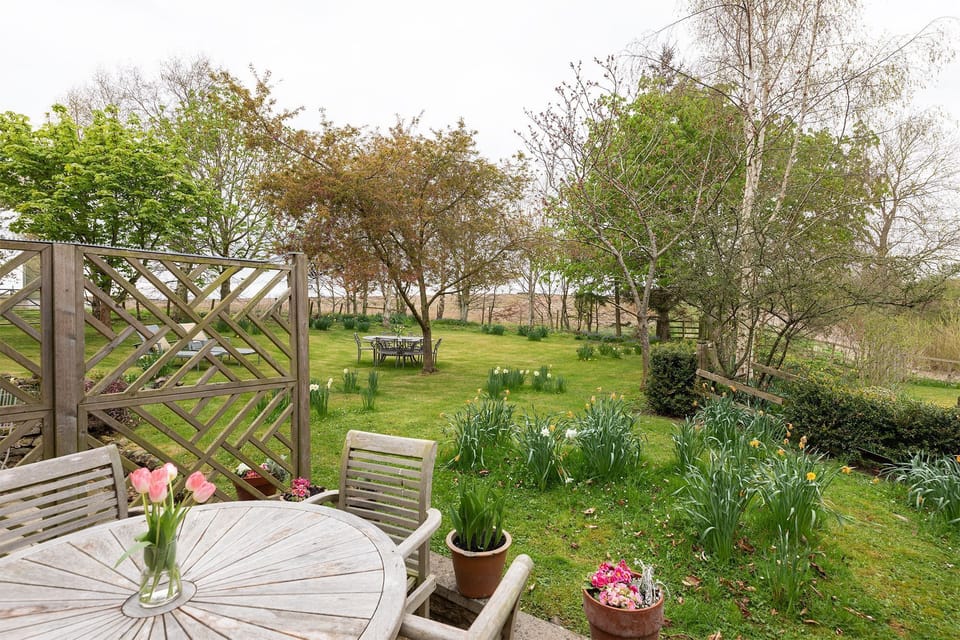The Wheel House - large shared garden with outdoor table and chairs