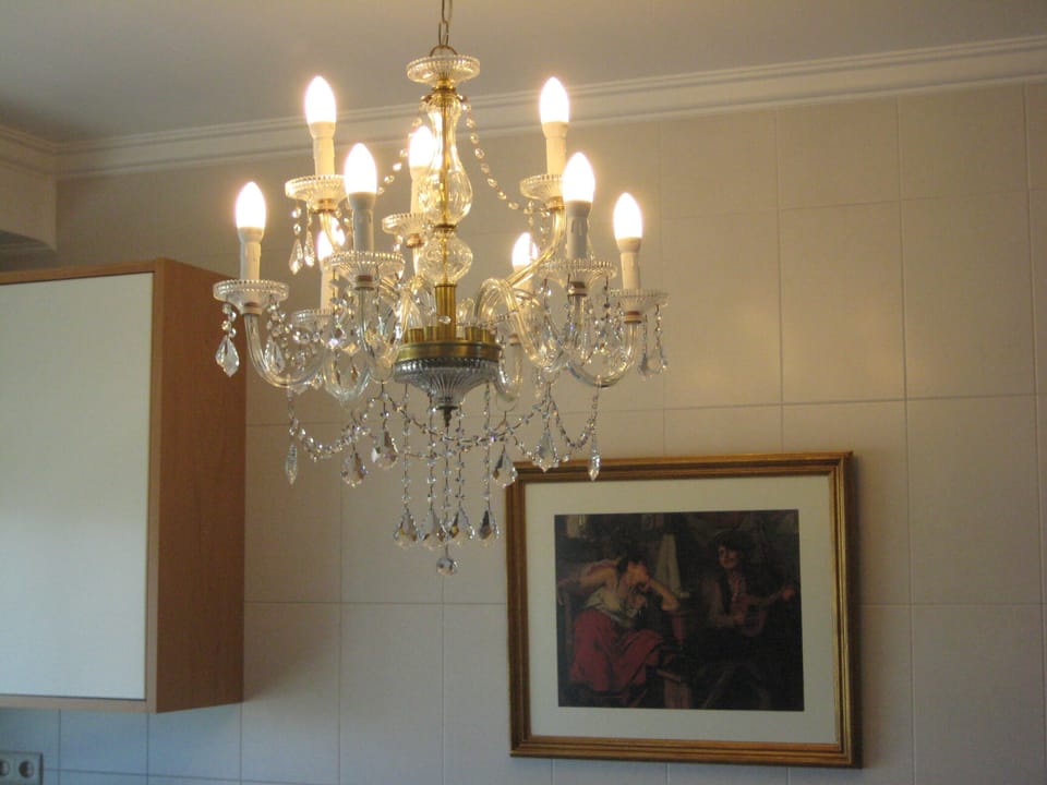 22. Haven in Lisbon. Kitchen. Crystal Chandelier. Fado Painting.