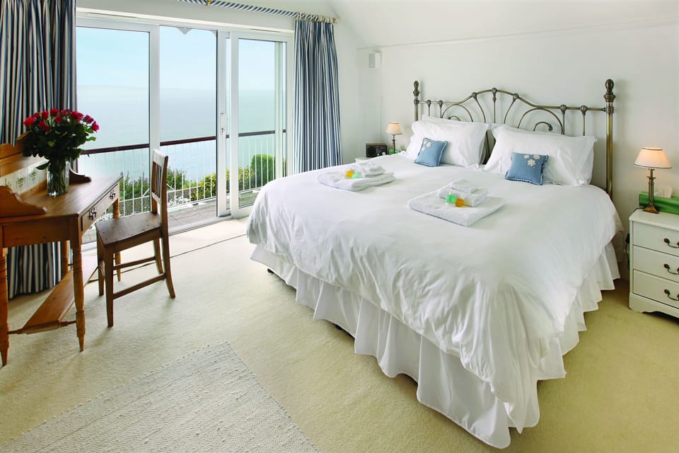 First floor: Master bedroom with a 6'6 bed with magnificent views and en suite bathroom