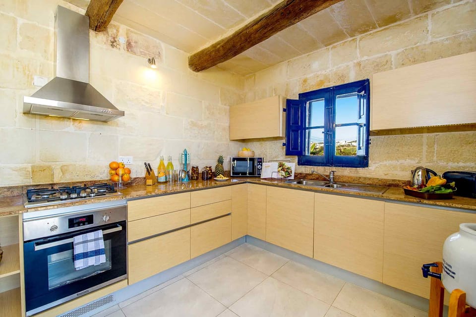 Kitchen of Dar il-Bahar Holiday Home in Gozo