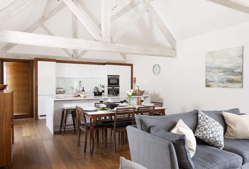 Open-plan sitting room, dining area and kitchen