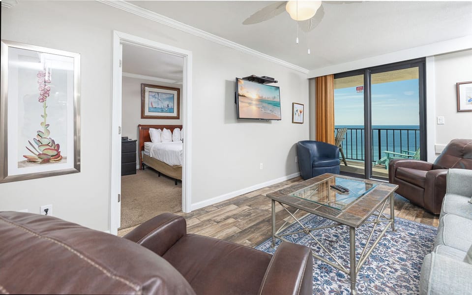 Relax in the cozy living area, enjoying the vibrant decor as you watch your favorite shows or movies