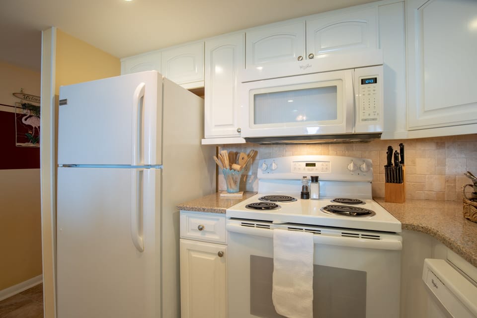 Everything is new 2017: appliances, tile floor, tile back splash, cabinets, quartz counter top, lighting, sink/faucet/disposal and paint.