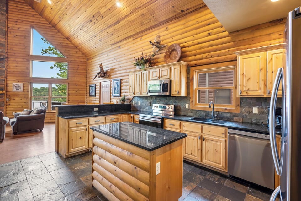 Fully equipped kitchen with solid granite countertops and Stainless appliances.