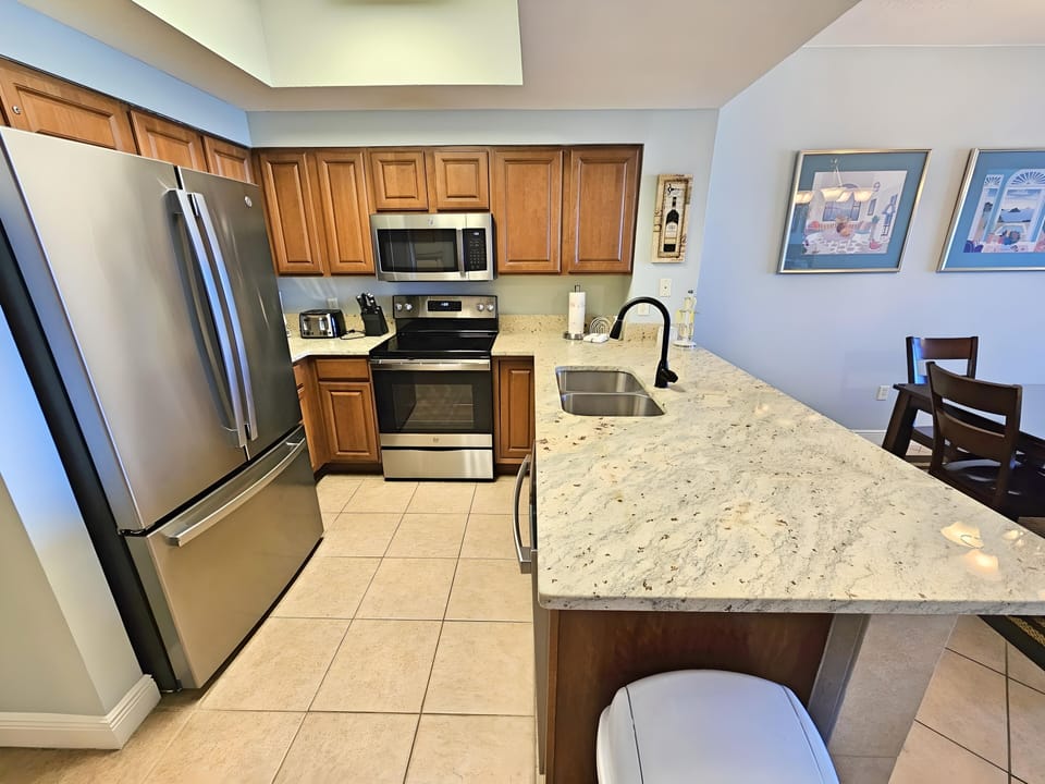 Remodeled kitchen with new stainless appliances