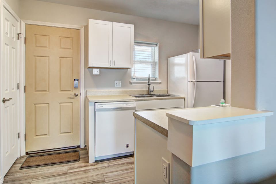 Your fully equipped kitchen features everything needed to prepare meals, with modern appliances and plenty of counter space for cooking.