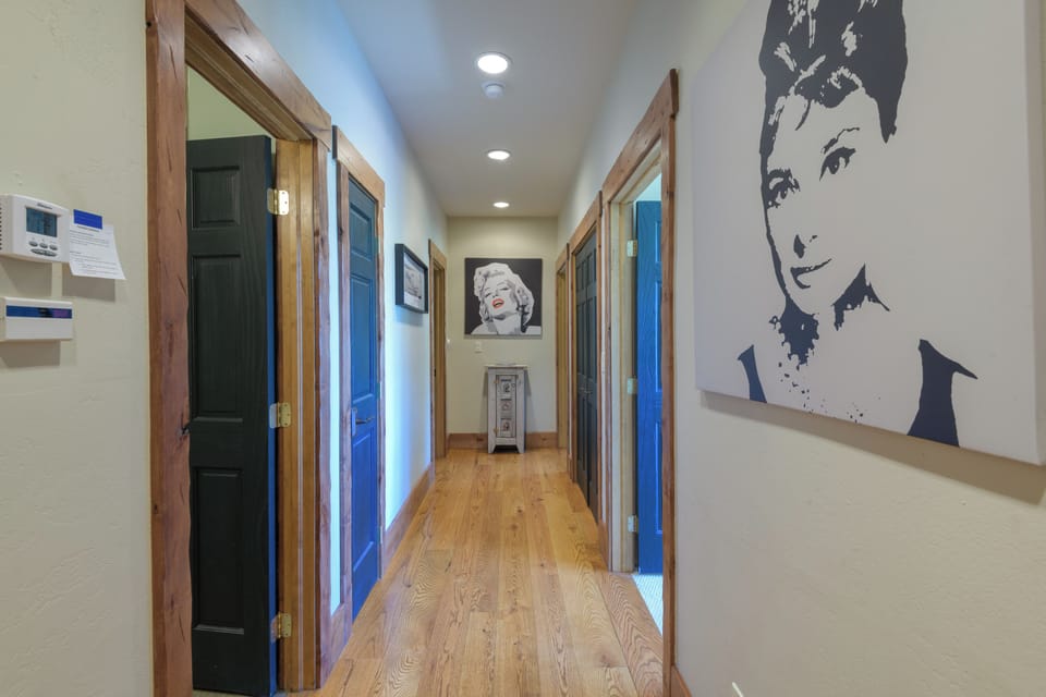 Downstairs main hallway and guest bedroom doors.