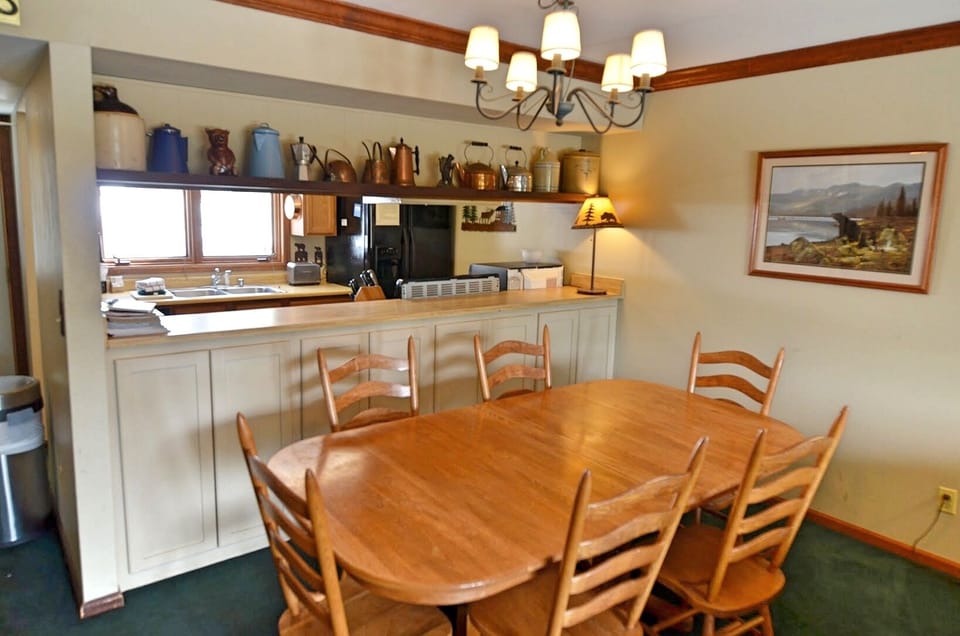 Dining and Kitchen Area - Spacious dining room area with fully equipped kitchen.