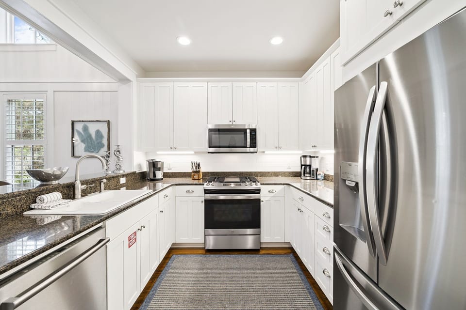 Your gourmet kitchen awaits with granite counters, stainless steel appliances, and everything you need to create memorable meals during your stay.