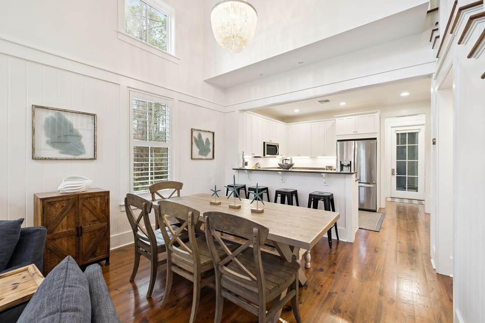 Gather around your beautiful dining table while your chef prepares meals in the gleaming kitchen just steps away.