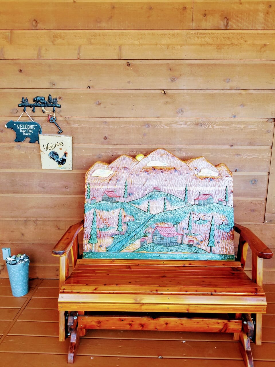 Beautiful locally made hand carved glider on deck. 