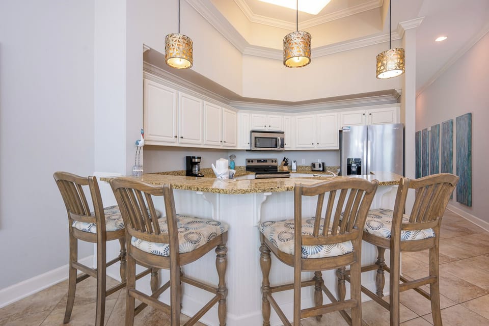 Gather your family at the cozy breakfast bar, sipping your favorite drinks while sharing laughter and stories