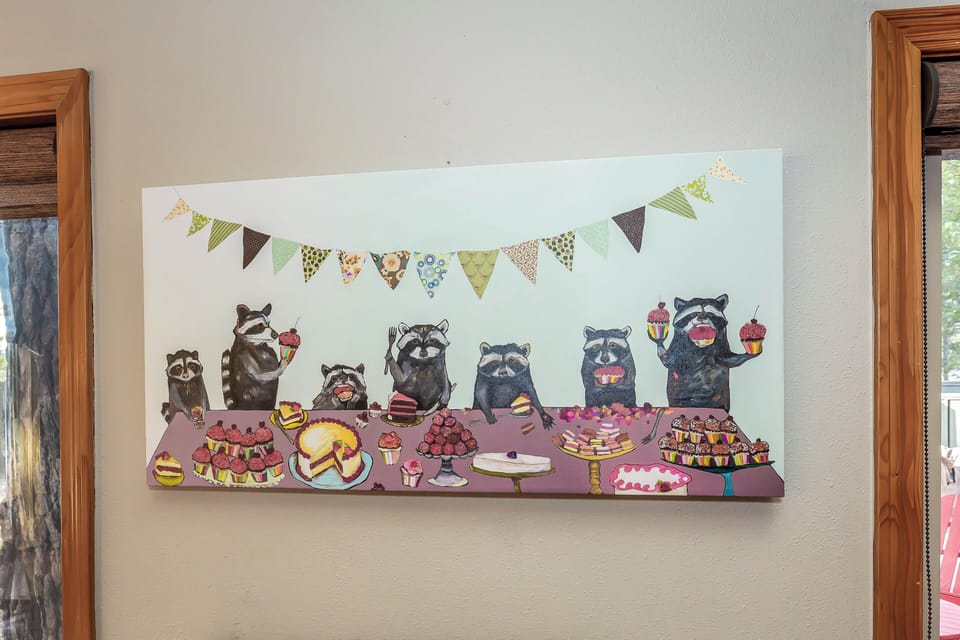 Whimsical raccoon party artwork