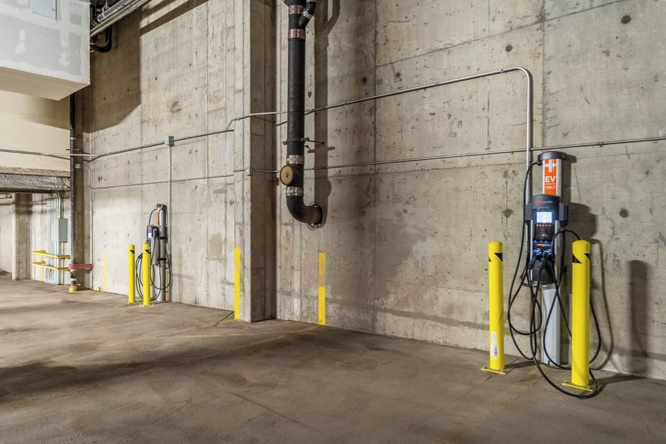 Secure on-site parking garage with electric vehicle charging stations available for your convenience during your stay.